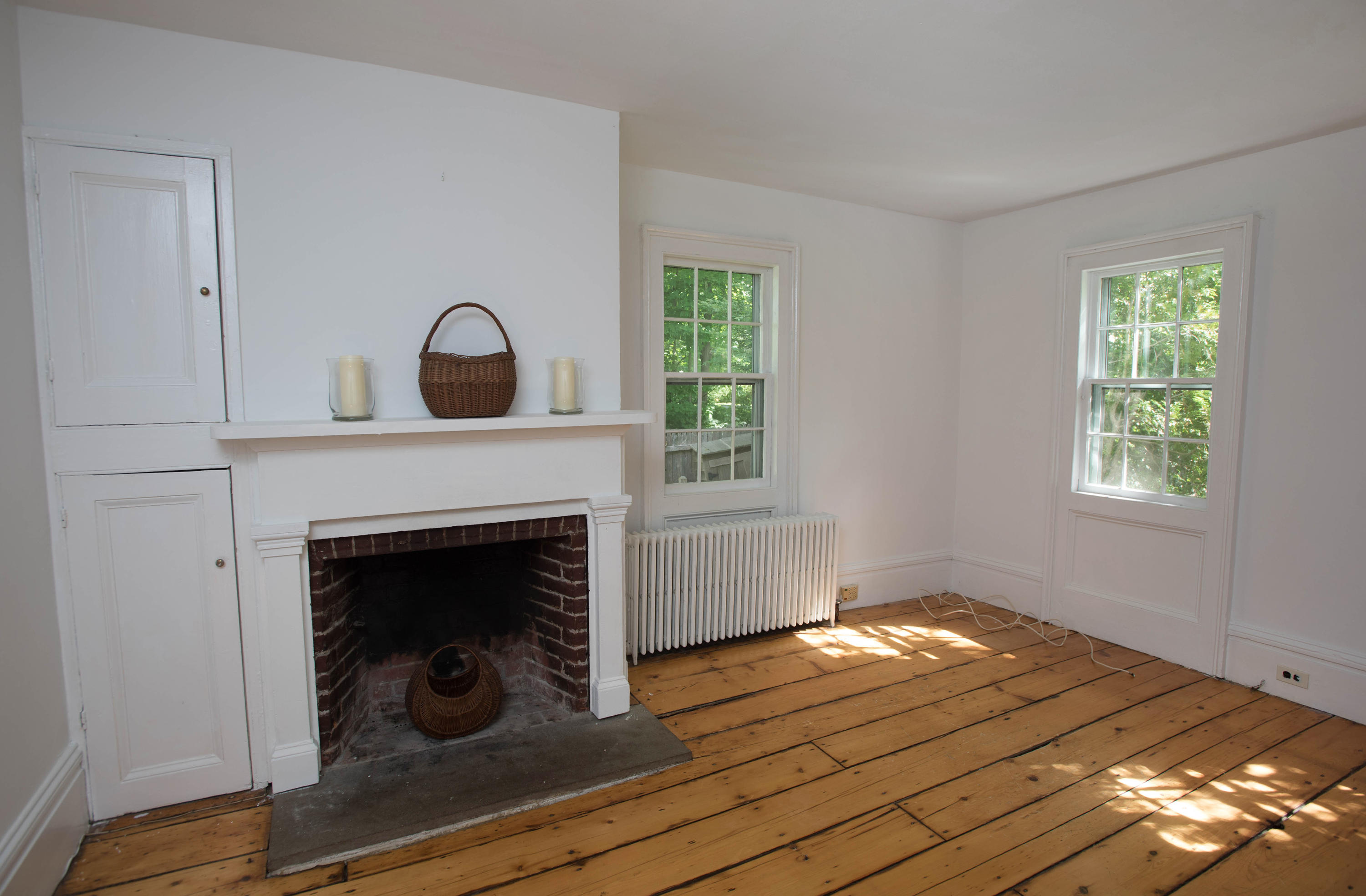 2884 Long Ridge Road Stamford, CT 06903 - Photo 8 of 20 a bedroom with a bed and a fireplace