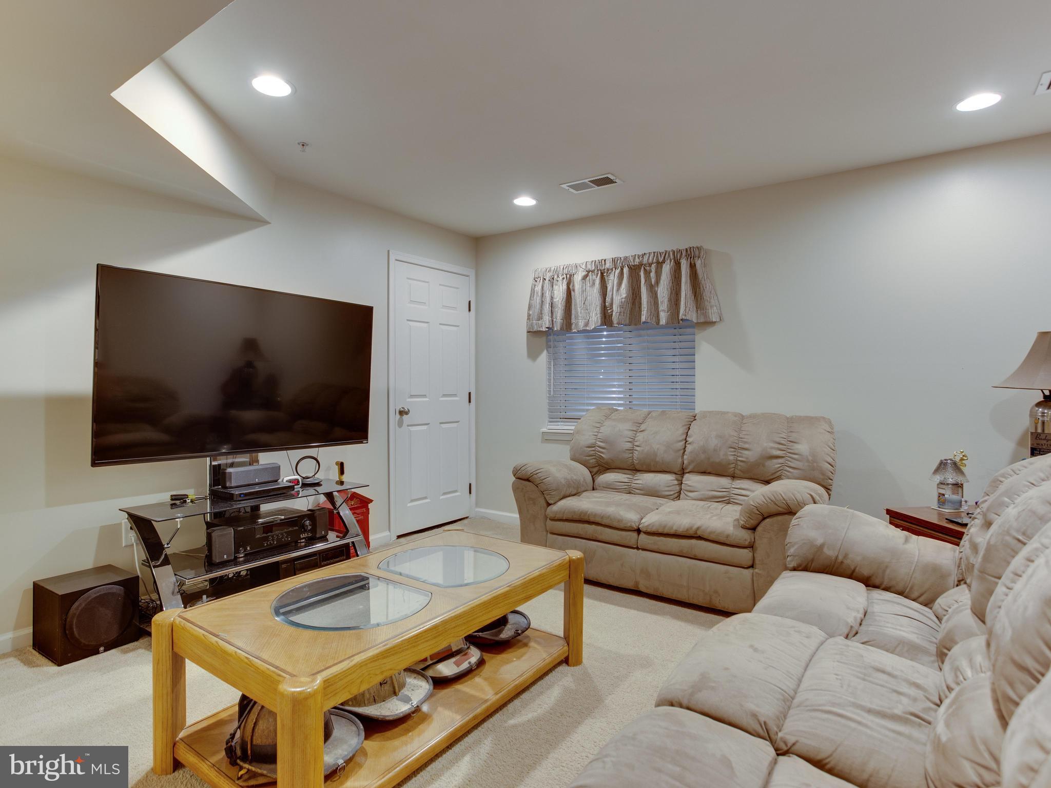 8022 Forest Ridge Drive, Unit 4 Chesapeake Beach, MD 20732 - Photo 13 of 32 Living / Entertainment Room - Lower Level