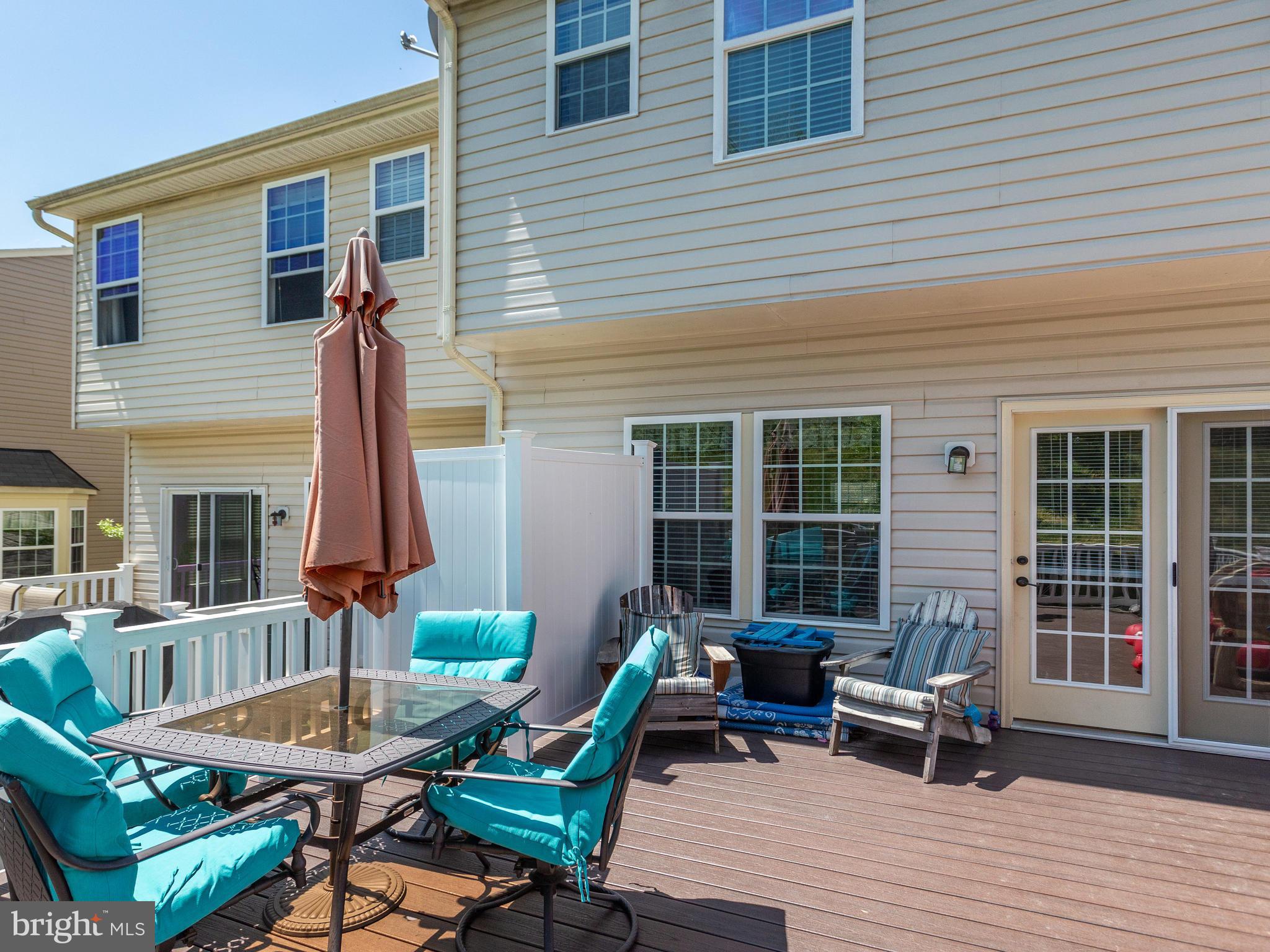 8022 Forest Ridge Drive, Unit 4 Chesapeake Beach, MD 20732 - Photo 24 of 32 Large Deck Area with Privacy wall off of Kitchen