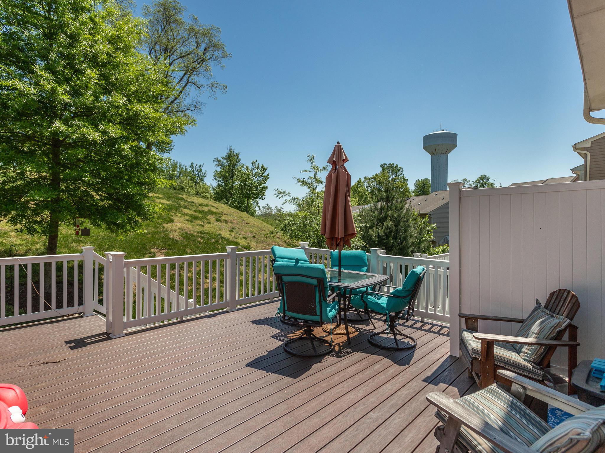 8022 Forest Ridge Drive, Unit 4 Chesapeake Beach, MD 20732 - Photo 25 of 32 Large Deck Area off of Kitchen with steps