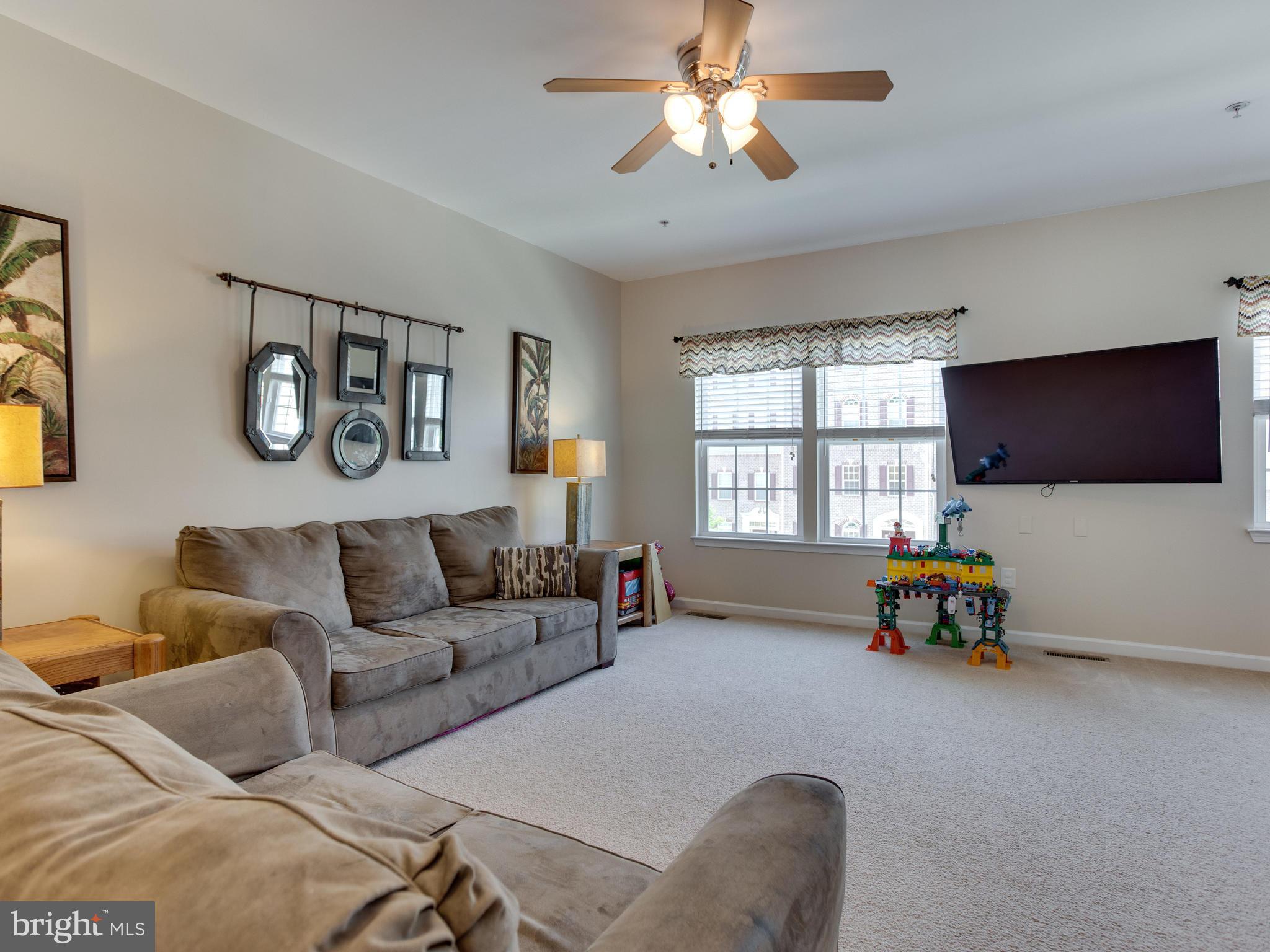 8022 Forest Ridge Drive, Unit 4 Chesapeake Beach, MD 20732 - Photo 3 of 32 Family Room Open to kitchen / tons of light