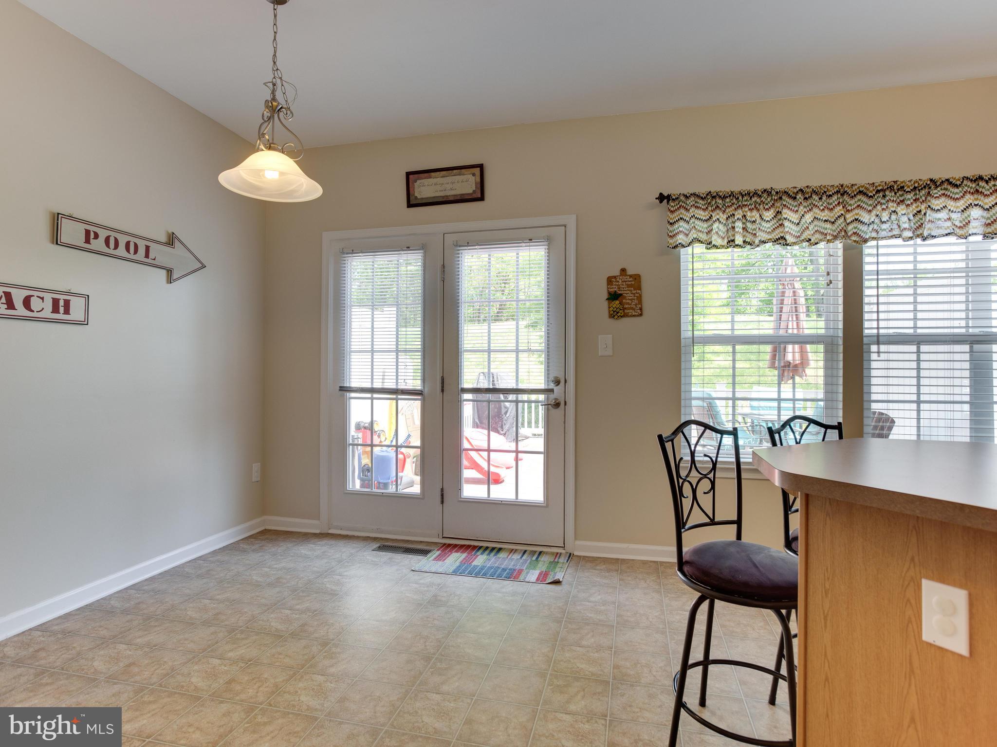 8022 Forest Ridge Drive, Unit 4 Chesapeake Beach, MD 20732 - Photo 6 of 32 Open Kitchen with eat in area