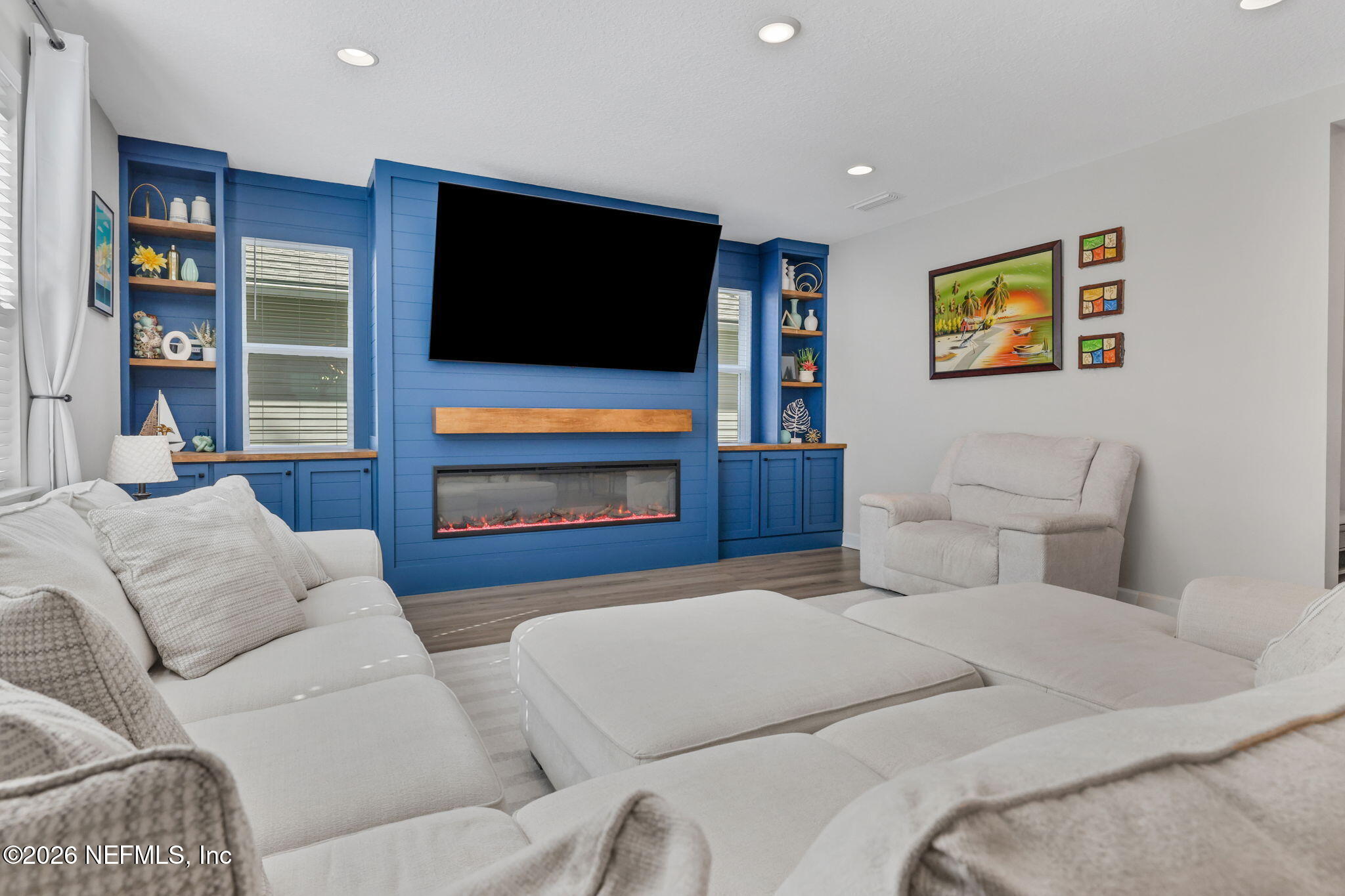 273 Little Bear Run St. Johns, FL 32259 - Photo 12 of 57 a living room with furniture and a flat screen tv
