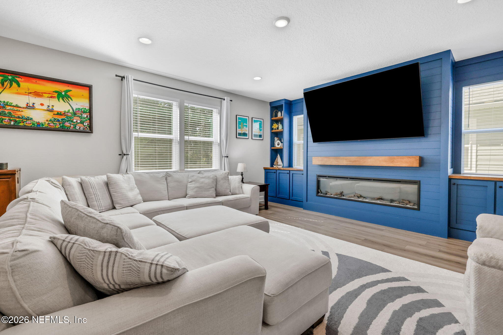 273 Little Bear Run St. Johns, FL 32259 - Photo 15 of 57 a living room with furniture and a flat screen tv