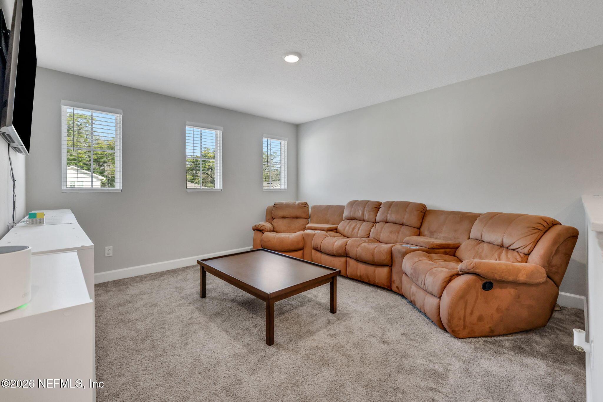 273 Little Bear Run St. Johns, FL 32259 - Photo 24 of 57 a living room with furniture and a window