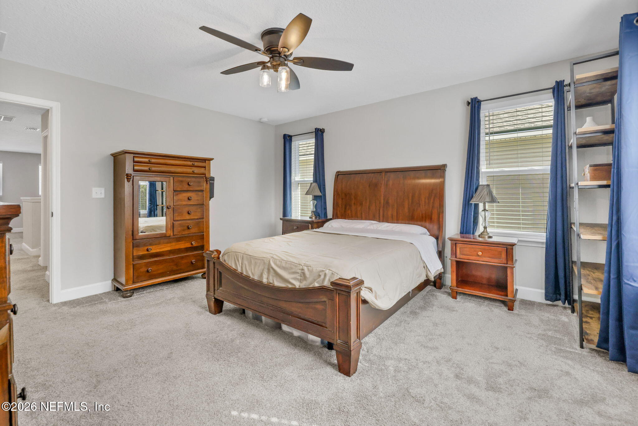 273 Little Bear Run St. Johns, FL 32259 - Photo 28 of 57 a bed sitting in a room next to a window
