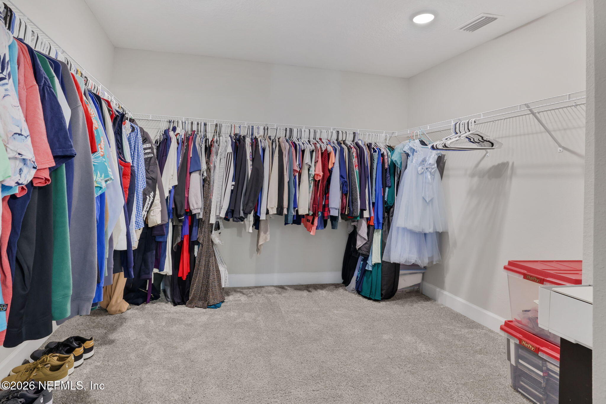 273 Little Bear Run St. Johns, FL 32259 - Photo 32 of 57 a view of walk in closet with clothes
