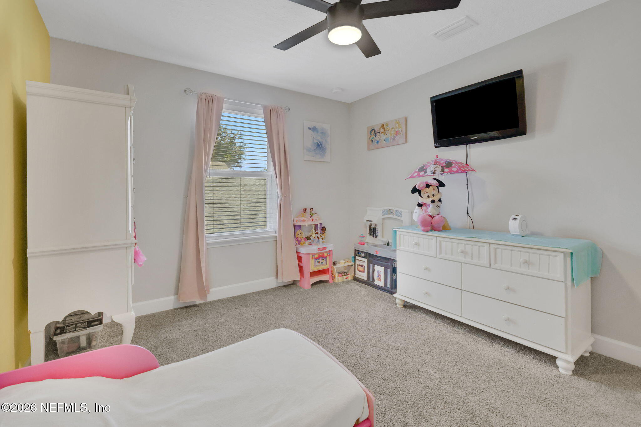 273 Little Bear Run St. Johns, FL 32259 - Photo 34 of 57 a bedroom with a bed and flat screen tv