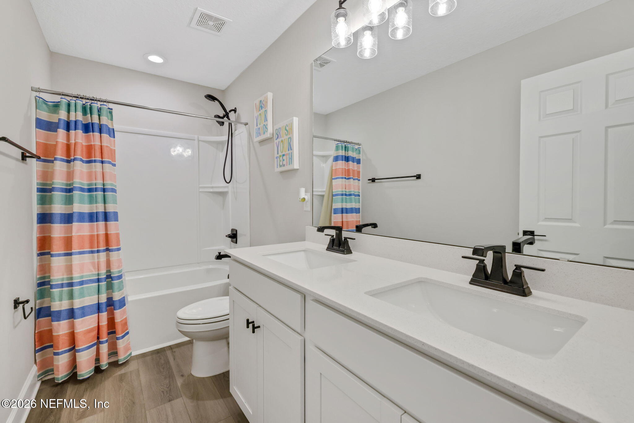 273 Little Bear Run St. Johns, FL 32259 - Photo 38 of 57 a bathroom with a sink a toilet and shower