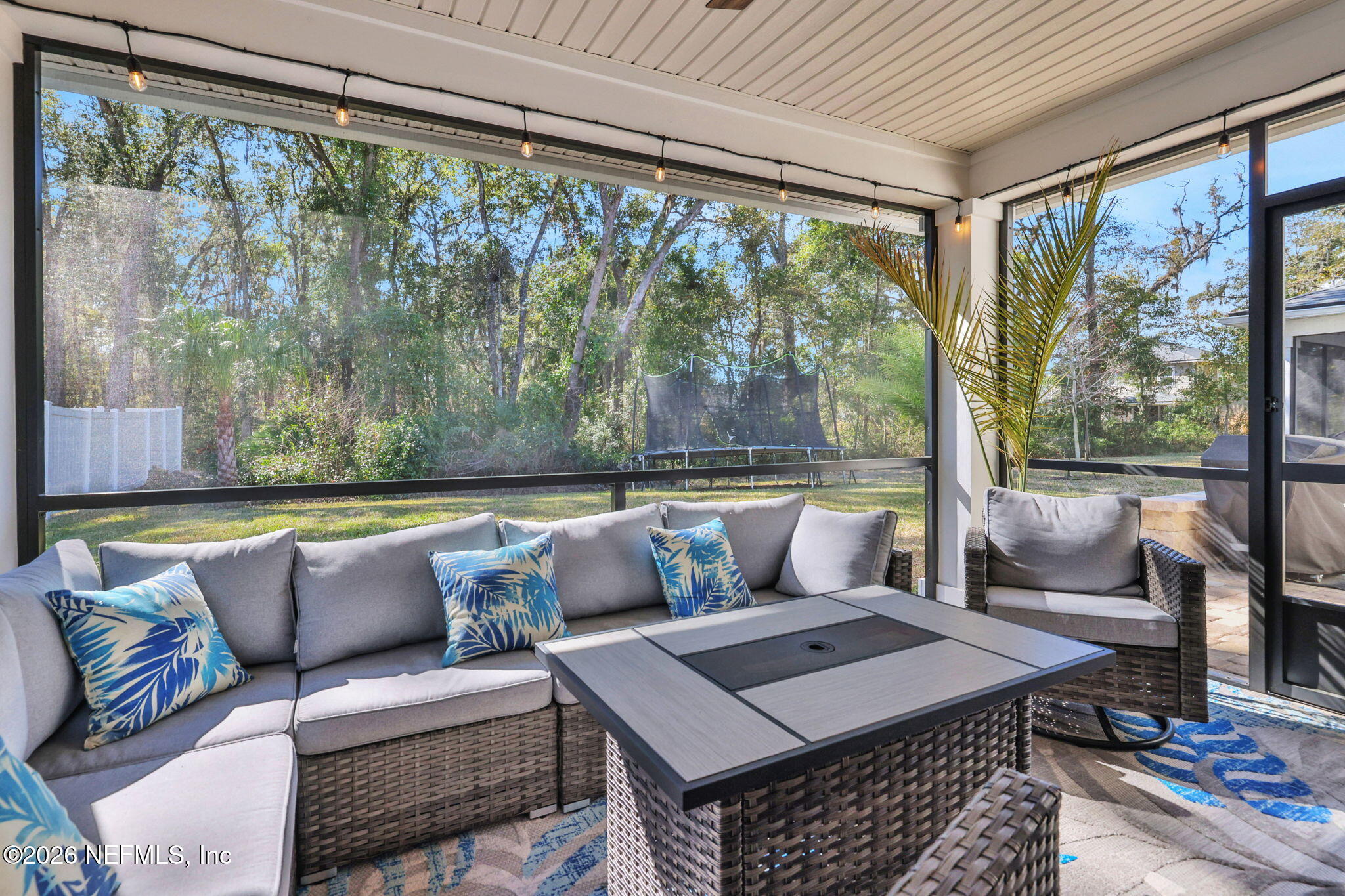 273 Little Bear Run St. Johns, FL 32259 - Photo 43 of 57 a living room with a couch and a table