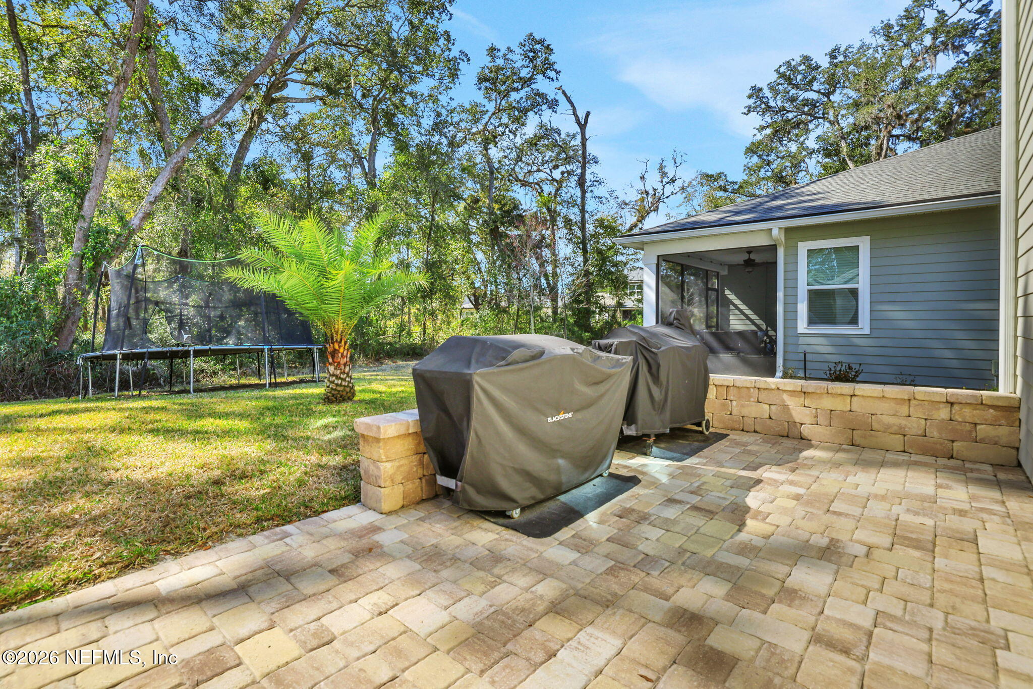 273 Little Bear Run St. Johns, FL 32259 - Photo 45 of 57 a view of a backyard with sitting area and garden