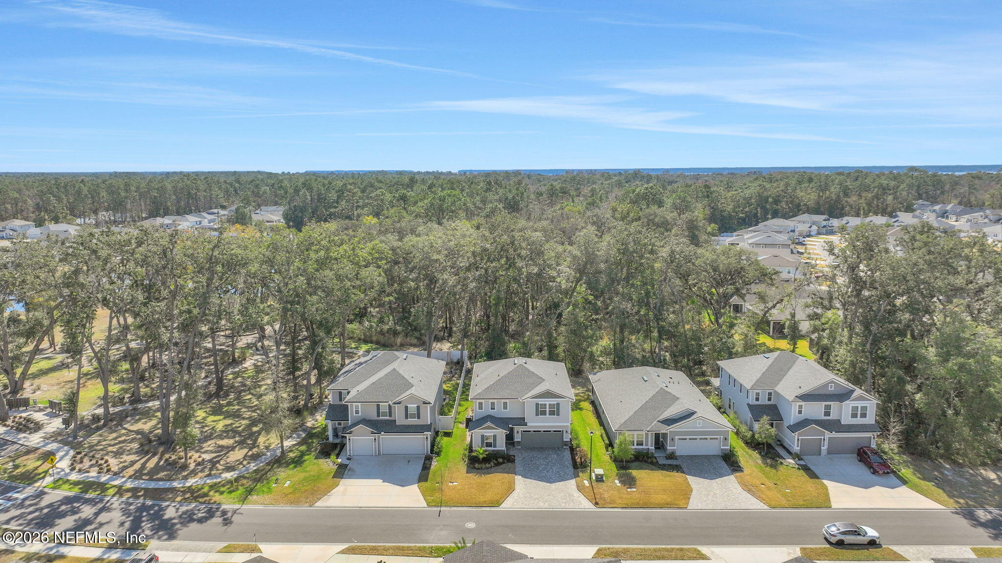 273 Little Bear Run St. Johns, FL 32259 - Photo 50 of 57 an aerial view of residential houses with outdoor space and parking