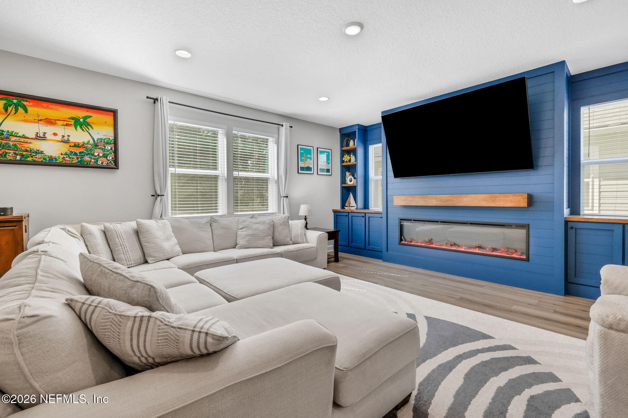 273 Little Bear Run St. Johns, FL 32259 - Photo 5 of 57 a living room with furniture and a flat screen tv