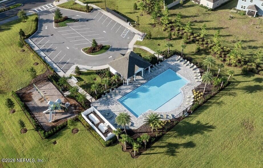 273 Little Bear Run St. Johns, FL 32259 - Photo 53 of 57 an aerial view of a house with a garden and swimming pool