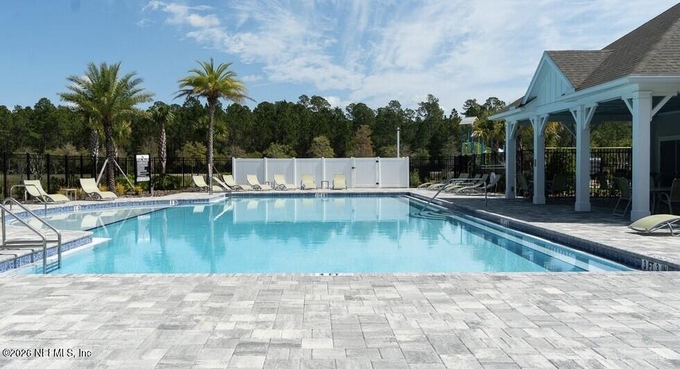 273 Little Bear Run St. Johns, FL 32259 - Photo 54 of 57 swimming view of a house with swimming pool and sitting area