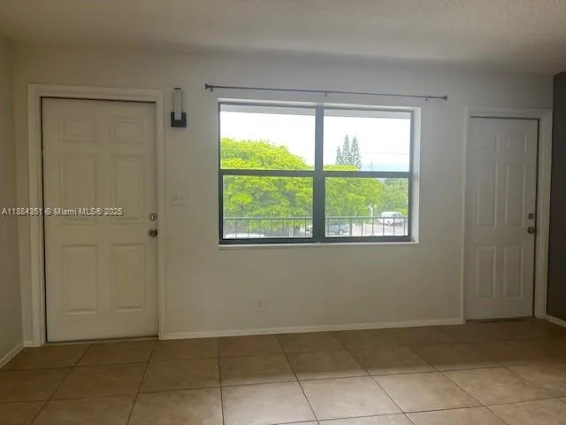 a view of entryway with bathroom