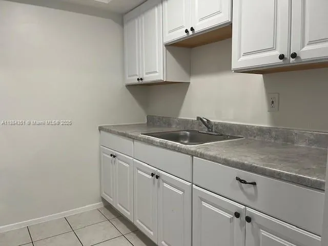 a bathroom with a sink a toilet and a bathtub