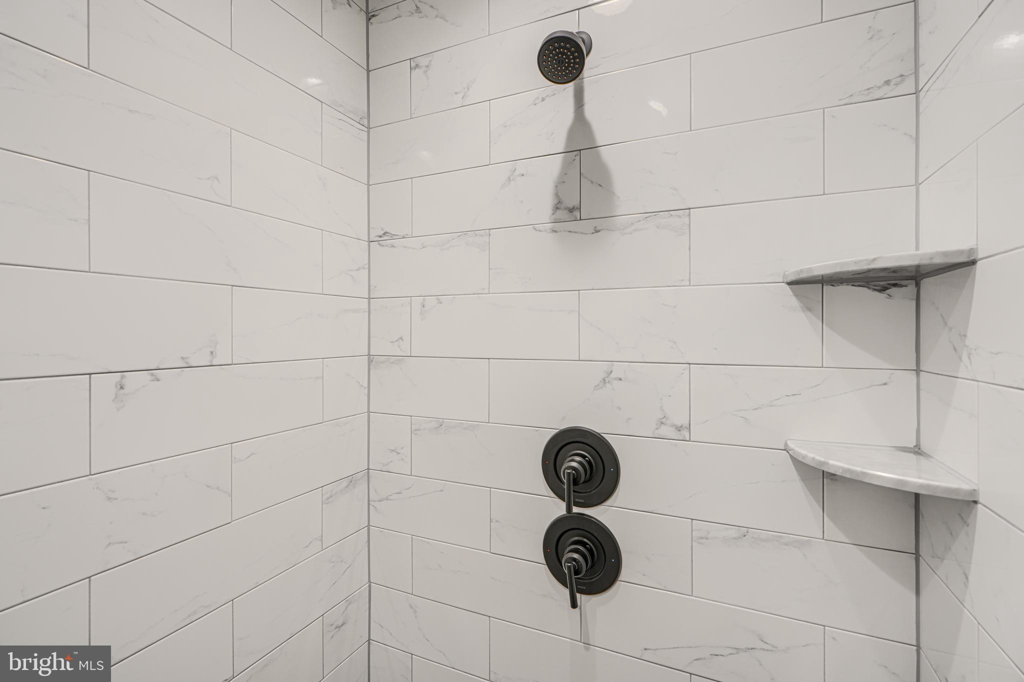 609 South Eaton Street Baltimore, MD 21224 - Photo 34 of 36 a bathroom with a shower