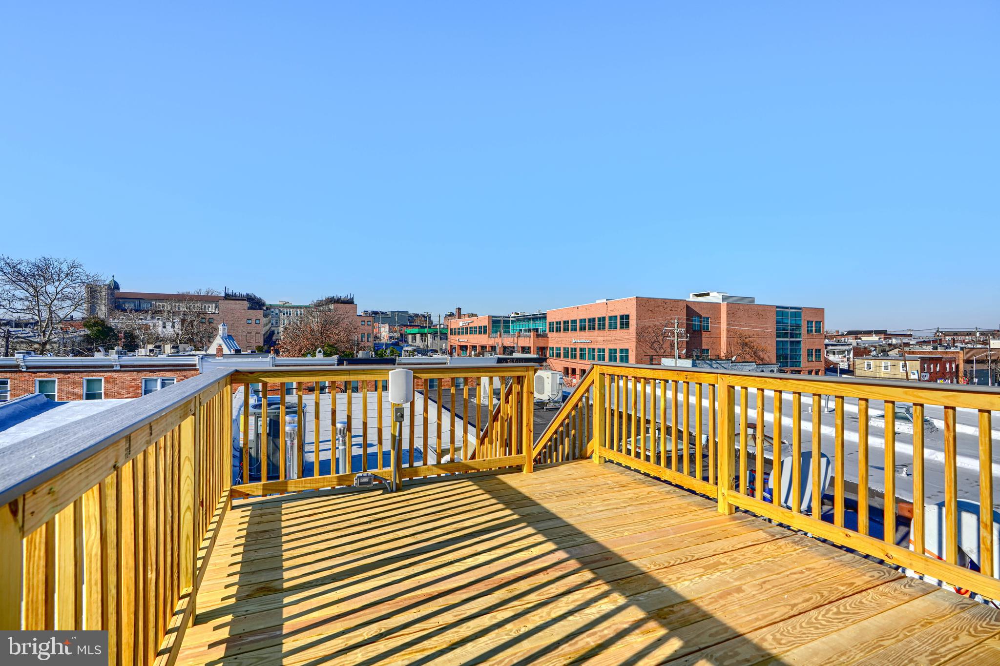609 South Eaton Street Baltimore, MD 21224 - Photo 36 of 36 a view of a balcony with wooden floor