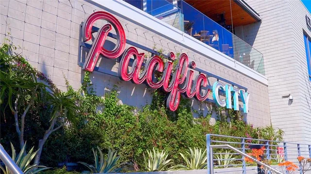 a front view of a building with glass windows