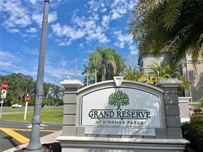 3325 South Kirkman Road, Unit 420 Orlando, FL 32811 - Photo 13 of 14 a view of a park that has a sign board