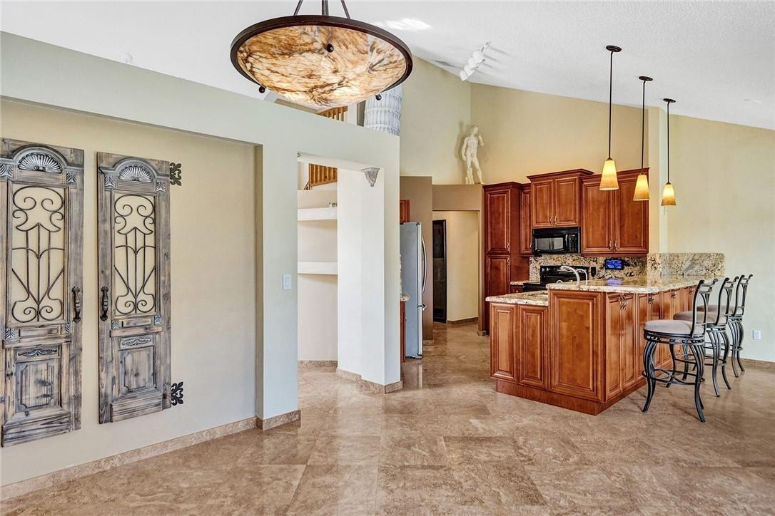 10576 Plainview Circle Boca Raton, FL 33498 - Photo 14 of 51 a view of a kitchen with furniture