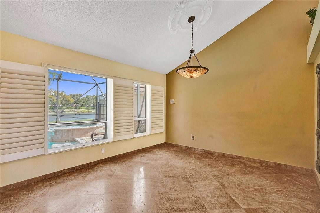 10576 Plainview Circle Boca Raton, FL 33498 - Photo 17 of 51 a view of an empty room with a window