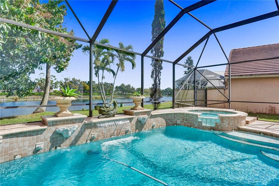 10576 Plainview Circle Boca Raton, FL 33498 - Photo 2 of 51 a view of a backyard with swimming pool