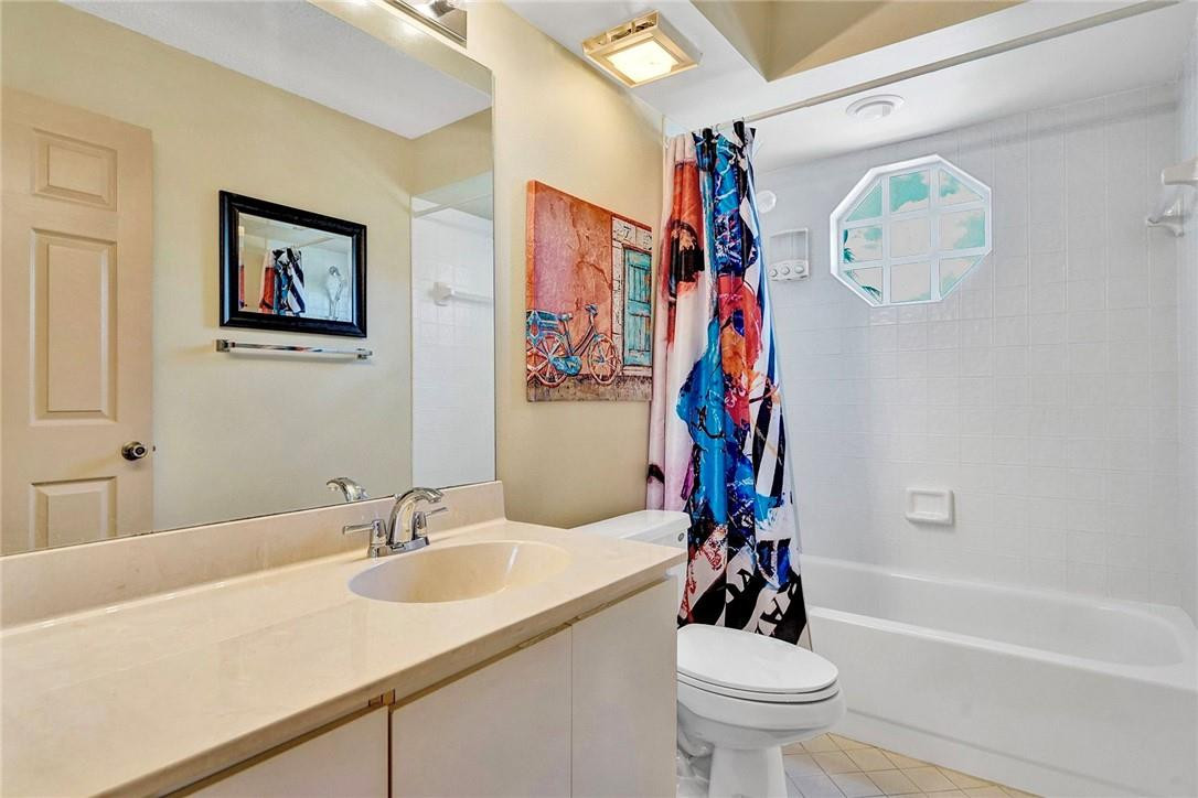 10576 Plainview Circle Boca Raton, FL 33498 - Photo 25 of 51 a bathroom with a sink a toilet and shower