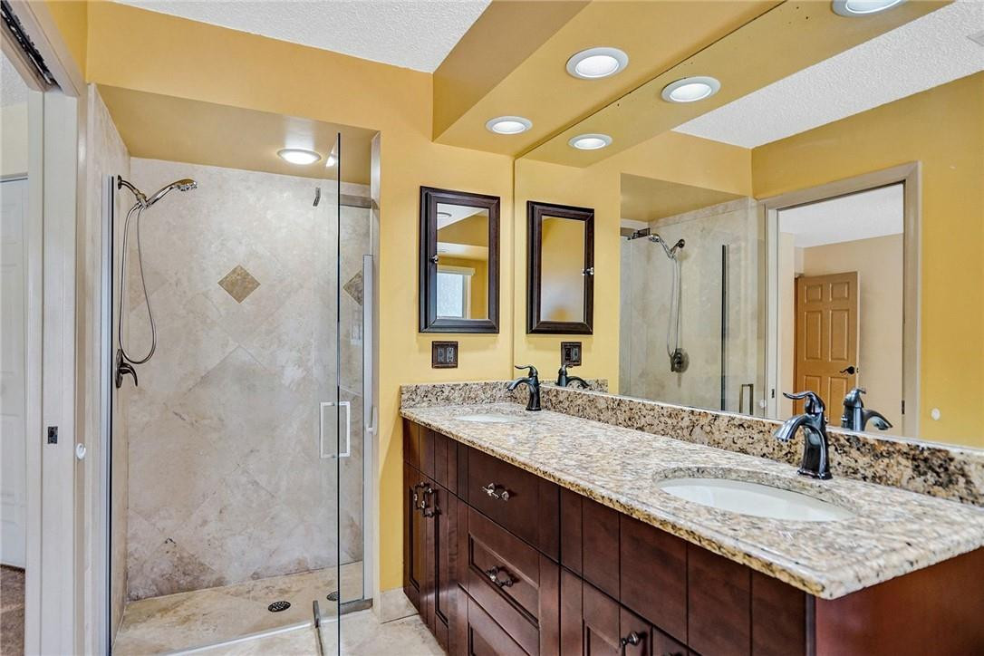 10576 Plainview Circle Boca Raton, FL 33498 - Photo 26 of 51 a bathroom with a granite countertop sink mirror and double