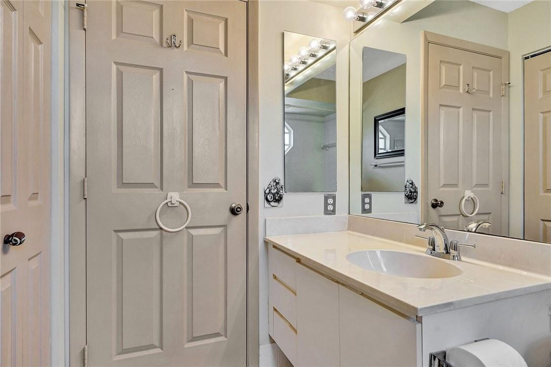 10576 Plainview Circle Boca Raton, FL 33498 - Photo 28 of 51 a bathroom with a sink and a mirror