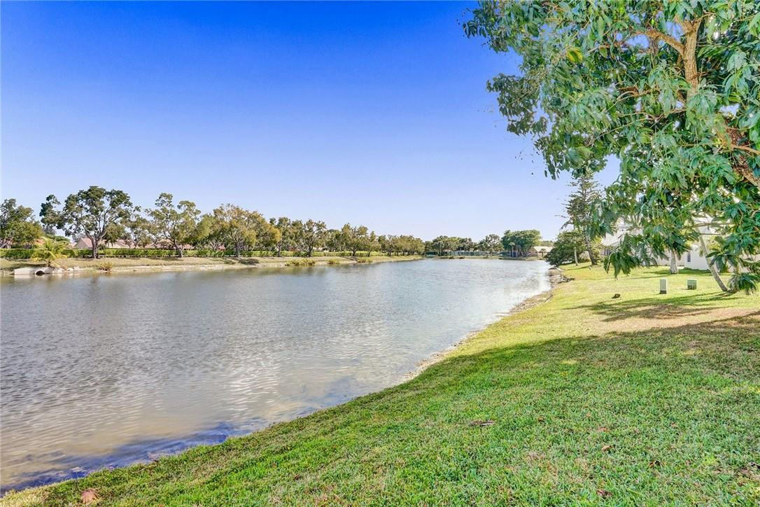 10576 Plainview Circle Boca Raton, FL 33498 - Photo 35 of 51 a view of a lake with houses in the back