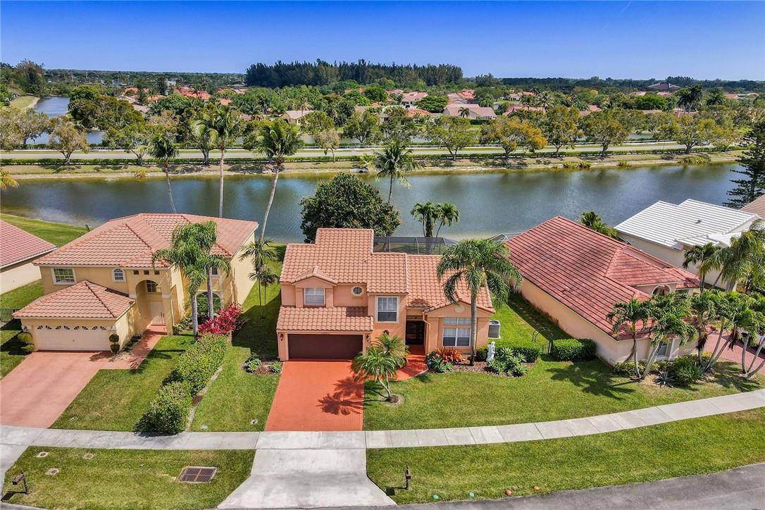 10576 Plainview Circle Boca Raton, FL 33498 - Photo 36 of 51 an aerial view of a house with a lake view