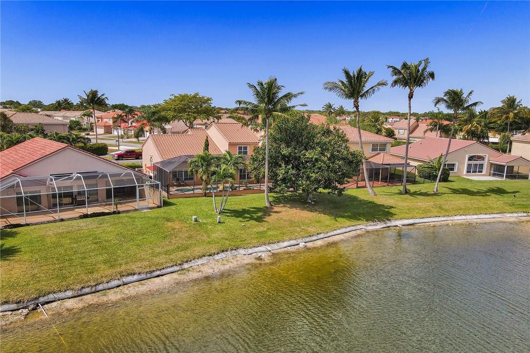 10576 Plainview Circle Boca Raton, FL 33498 - Photo 38 of 51 a view of a house with a big yard