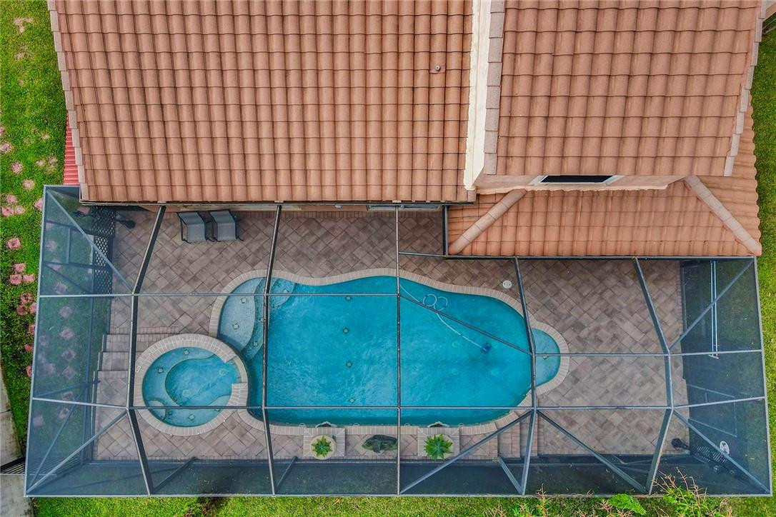 10576 Plainview Circle Boca Raton, FL 33498 - Photo 39 of 51 a backyard of a house with outdoor seating