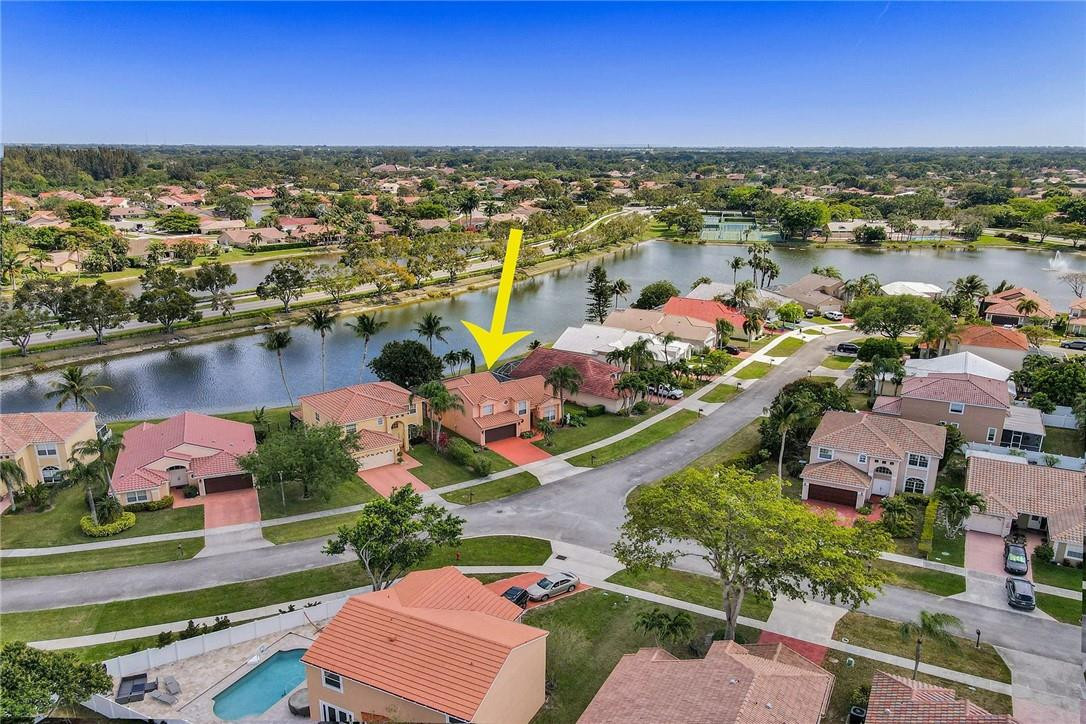 10576 Plainview Circle Boca Raton, FL 33498 - Photo 41 of 51 an aerial view of residential houses with outdoor space