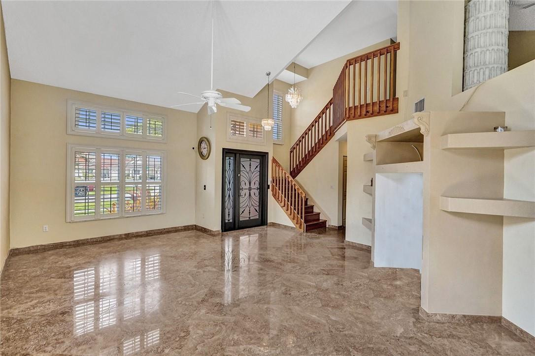 10576 Plainview Circle Boca Raton, FL 33498 - Photo 8 of 51 a view of an entryway with staircase