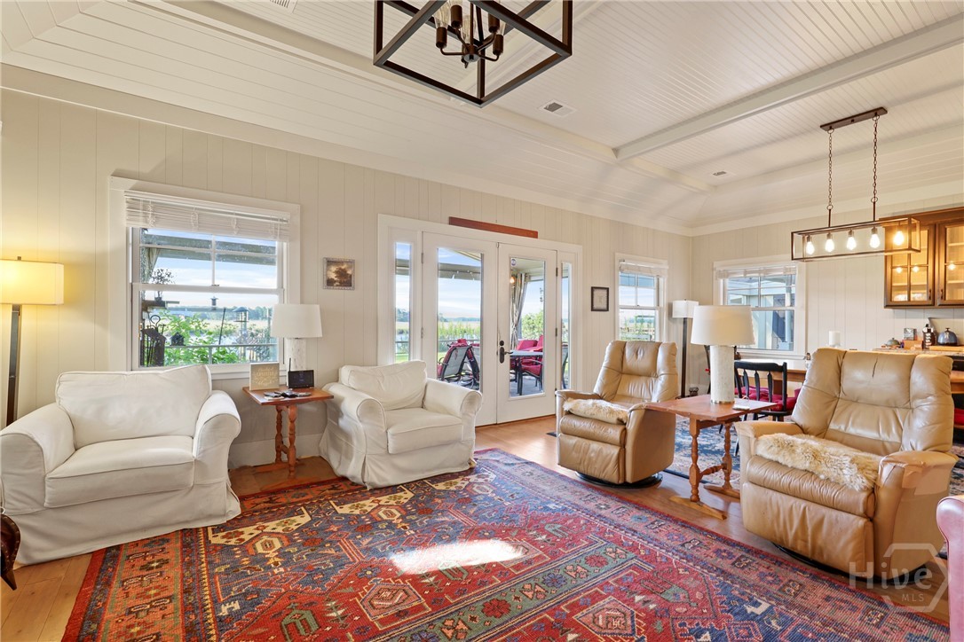 189 East 1st Street Midway, GA 31320 - Photo 11 of 50 Spacious light filled great room, open to dining and kitchen