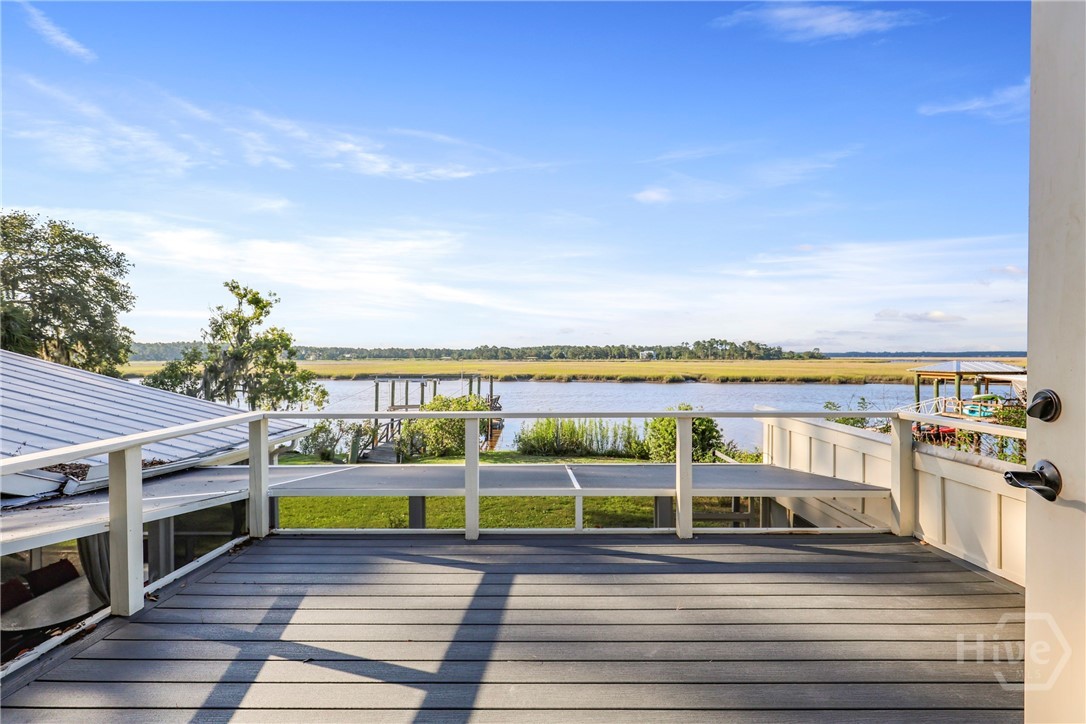189 East 1st Street Midway, GA 31320 - Photo 31 of 50 Private deck with composite decking material off the second floor owner suite