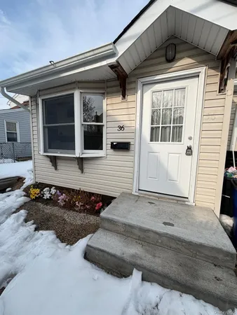 a front view of a house with garage