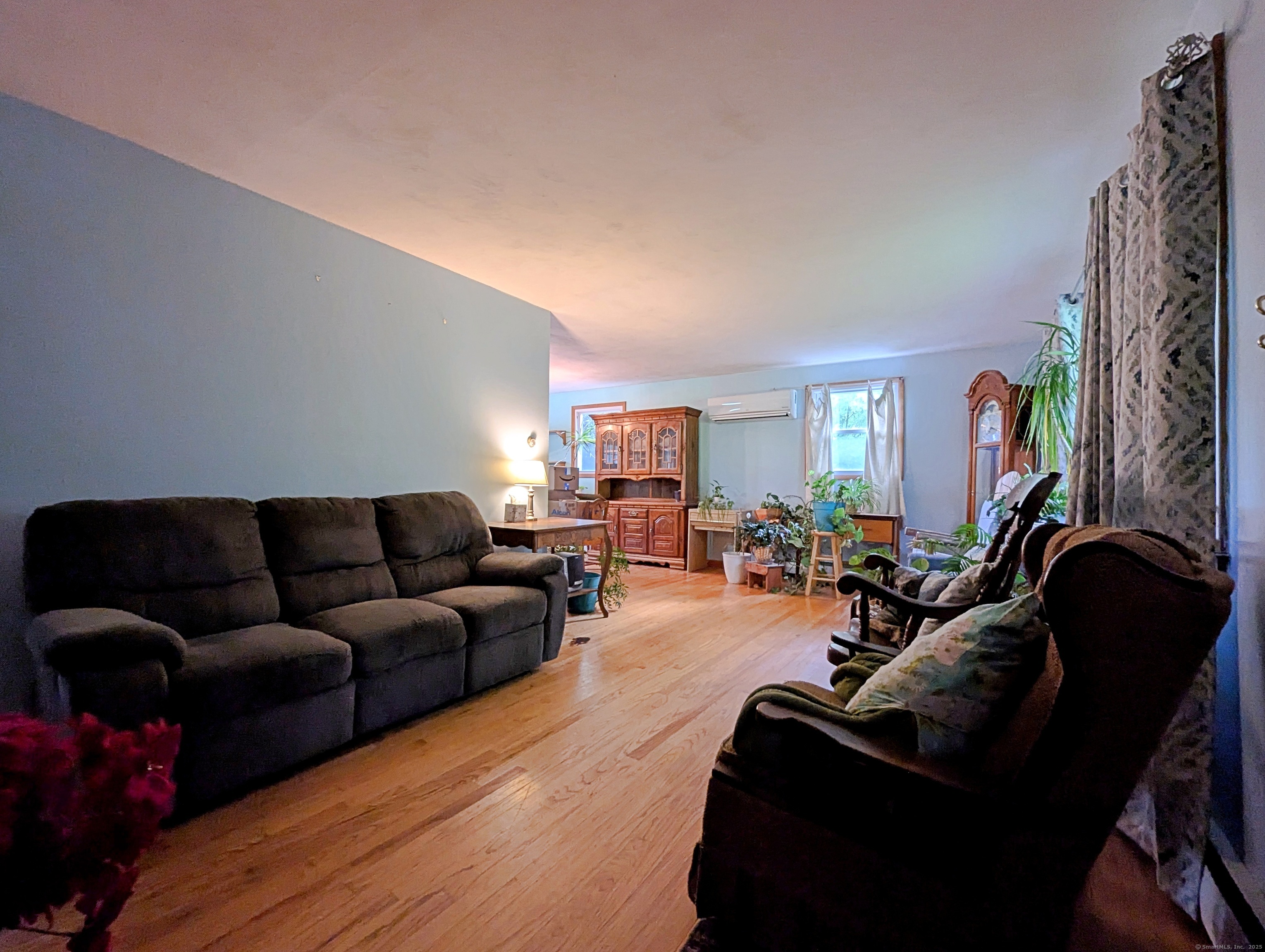 72 Morris Road Prospect, CT 06712 - Photo 11 of 27 a living room with furniture and a couch