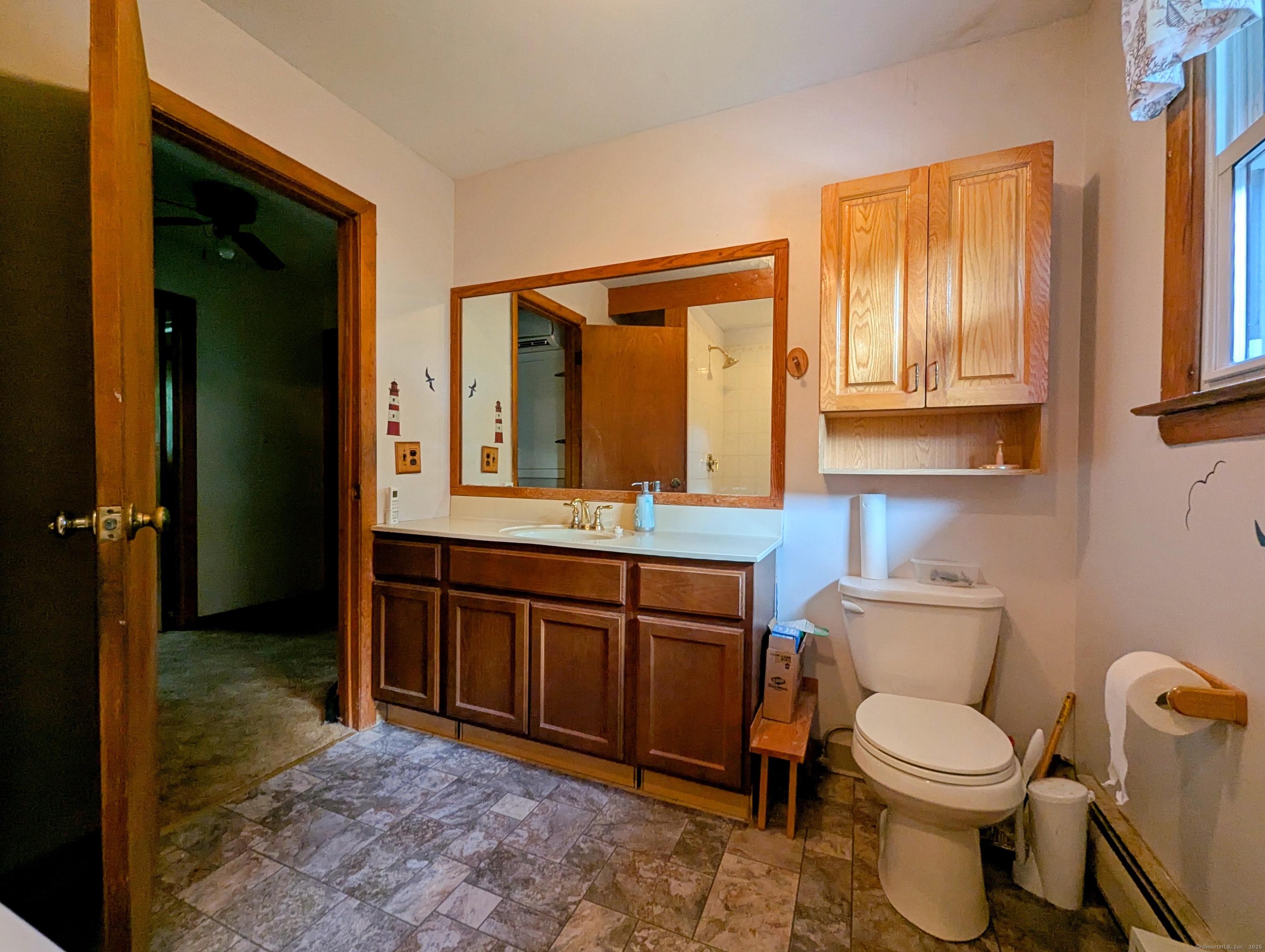 72 Morris Road Prospect, CT 06712 - Photo 14 of 27 a bathroom with a toilet a sink and mirror
