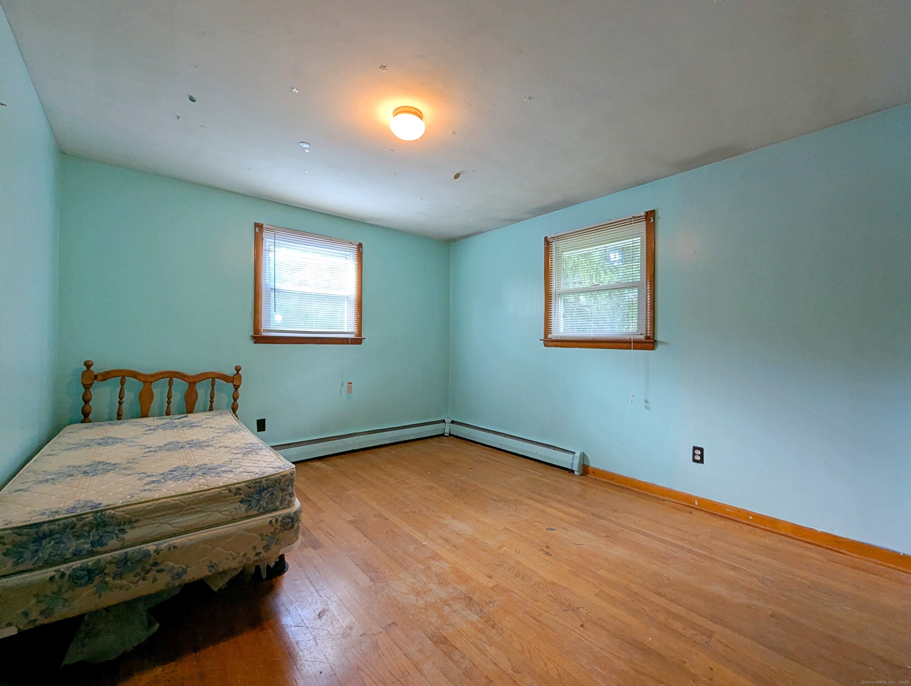 72 Morris Road Prospect, CT 06712 - Photo 17 of 27 a bedroom with a bed and a window