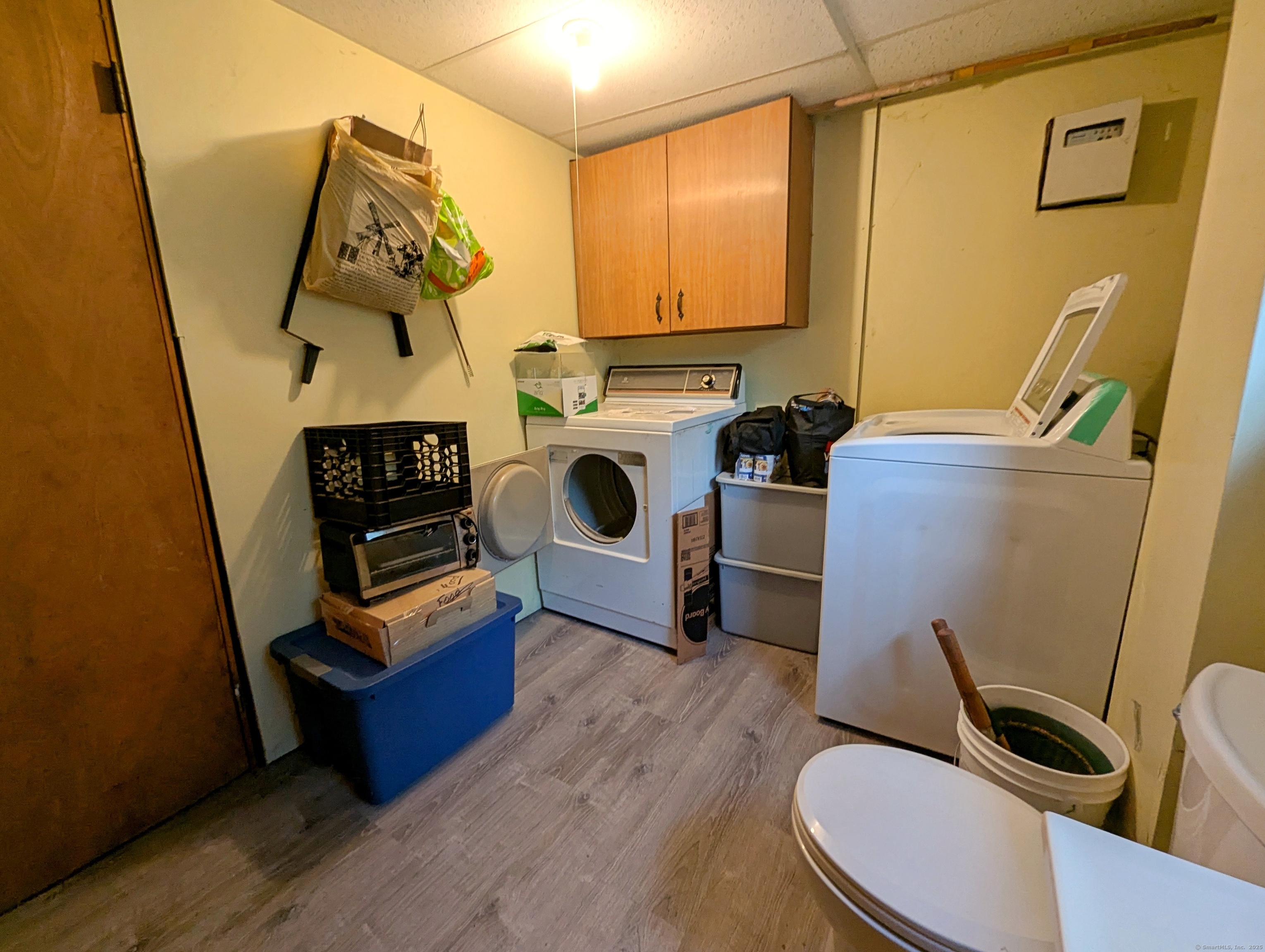 72 Morris Road Prospect, CT 06712 - Photo 22 of 27 a view of living room with washer and dryer