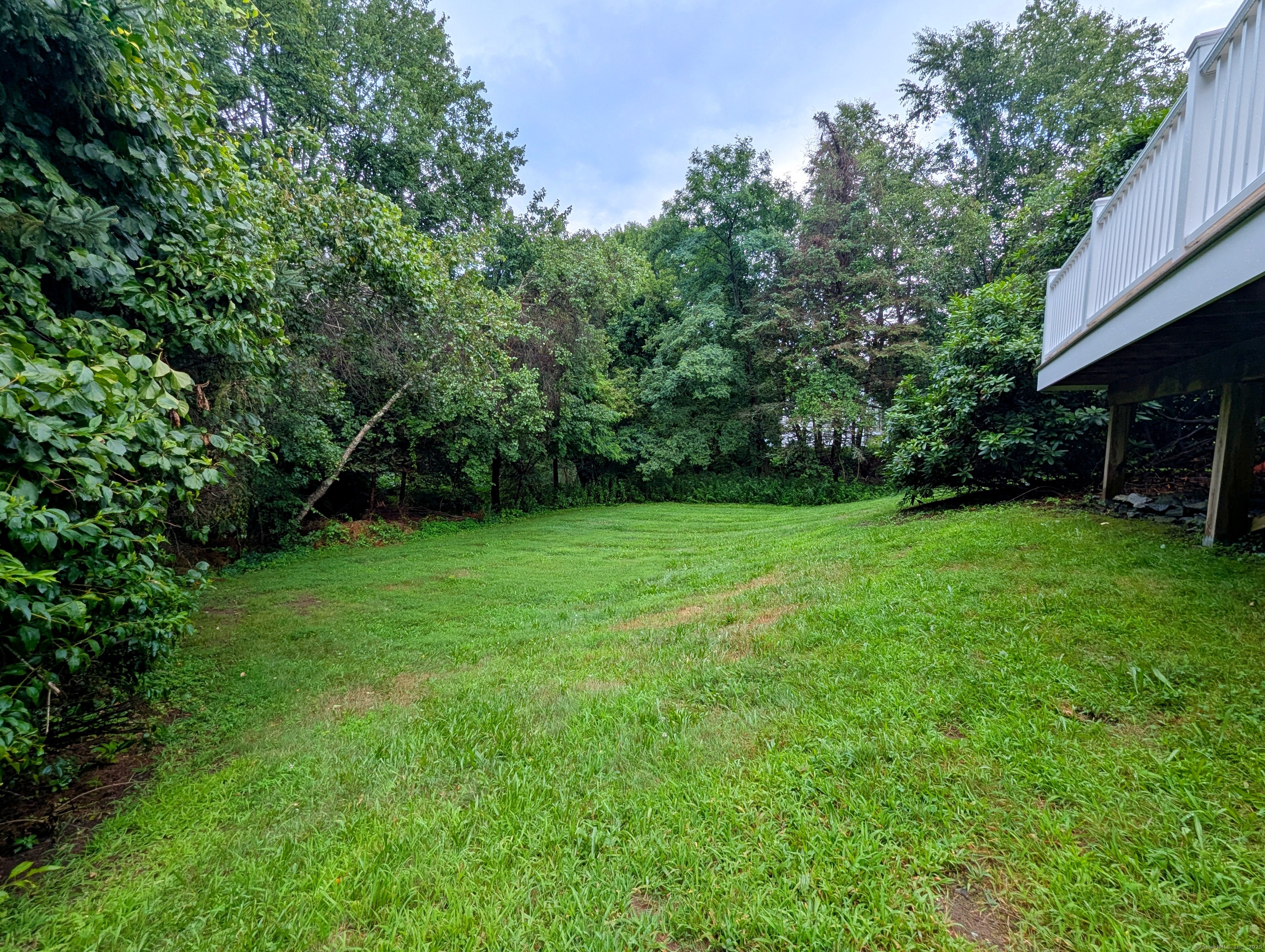 72 Morris Road Prospect, CT 06712 - Photo 26 of 27 a view of a backyard with a garden