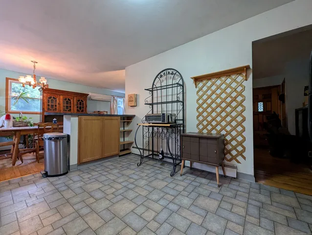 a view of a workspace with furniture