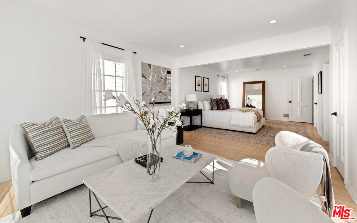 625 Sierra Drive Beverly Hills, CA 90210 - Photo 11 of 25 a living room with furniture and wooden floor
