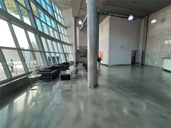 a view of an entryway with a fountain