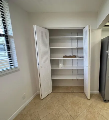 a view of room with empty racks