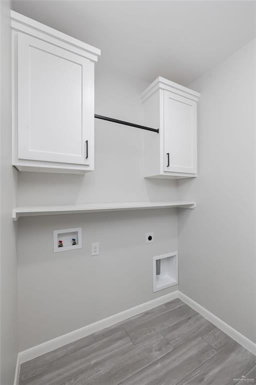 7710 Navel Lane Mission, TX 78574 - Photo 18 of 20 a view of white cabinets